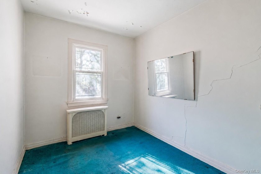 Welcome to this charming semi-detached brick home in the heart - photo 13