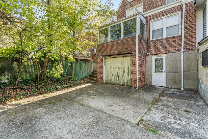 Welcome to this charming semi-detached brick home in the heart - photo 21