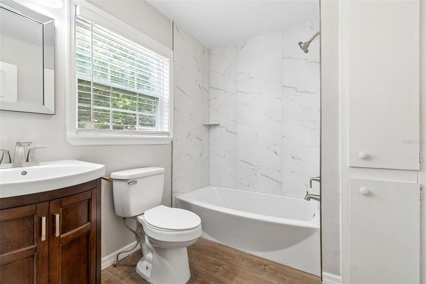 Welcome to this updated 3-bedroom, 2-bath home offering a - photo 31