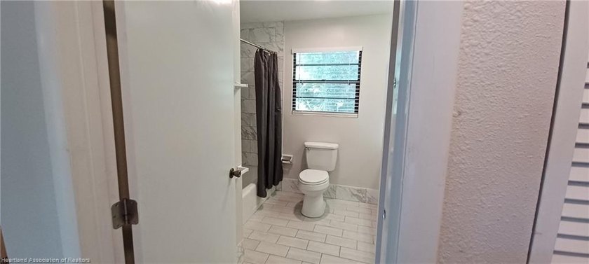 Welcome to your private slice of Old Florida charm. Set across - photo 15