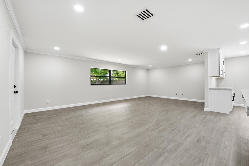 Fully remodeled 3-bedroom, 2-bath home with an attached garage - photo 8