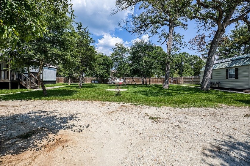 ***PRICE REDUCTION*** Nestled on a serene one-acre lot, this - photo 4