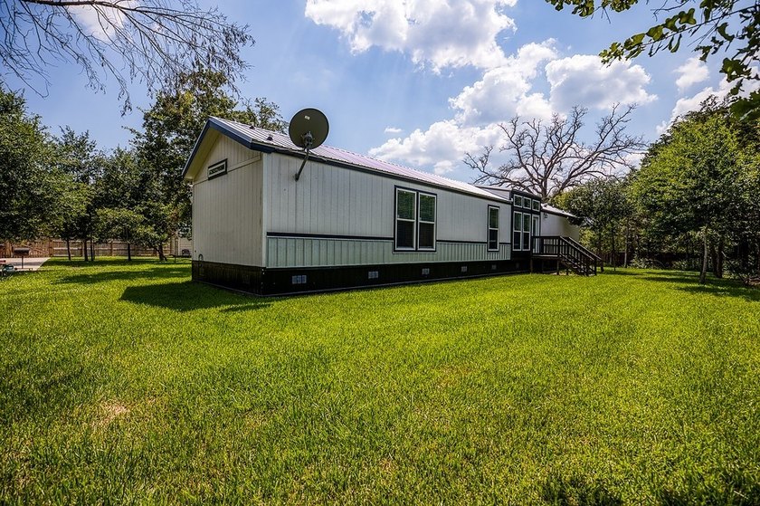 ***PRICE REDUCTION*** Nestled on a serene one-acre lot, this - photo 8