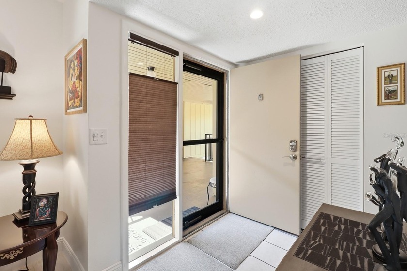 Welcome to this beautifully RENOVATED second-floor condo - photo 8