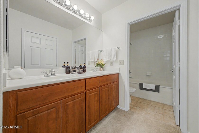 Nestled within the gated Sienna Condominiums in Scottsdale, just - photo 15