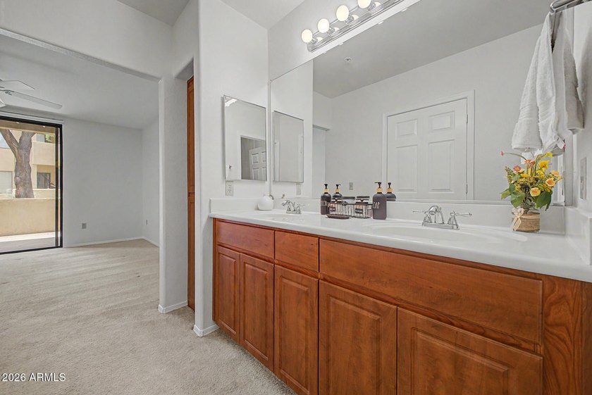 Nestled within the gated Sienna Condominiums in Scottsdale, just - photo 16