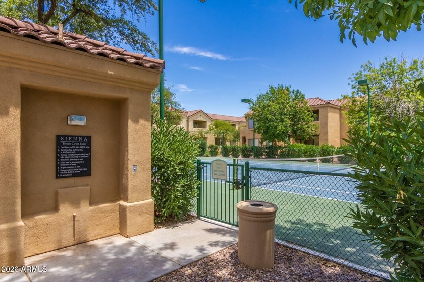 Nestled within the gated Sienna Condominiums in Scottsdale, just - photo 32