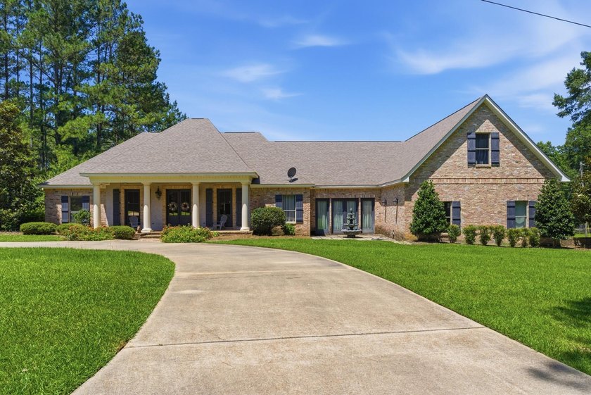 Perfectly situated on nearly 5 acres, a 5000 sq ft home plus a - photo 3