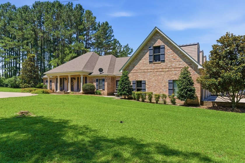 Perfectly situated on nearly 5 acres, a 5000 sq ft home plus a - photo 4