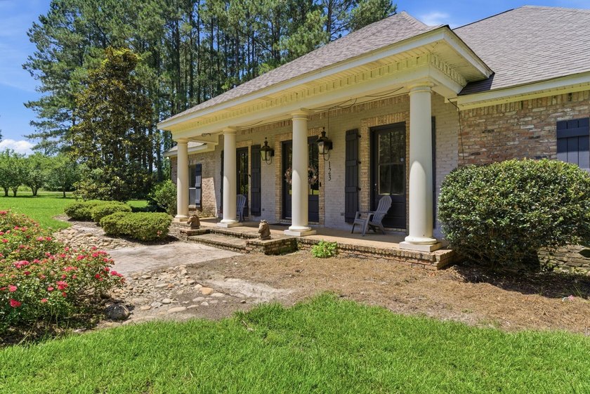 Perfectly situated on nearly 5 acres, a 5000 sq ft home plus a - photo 10