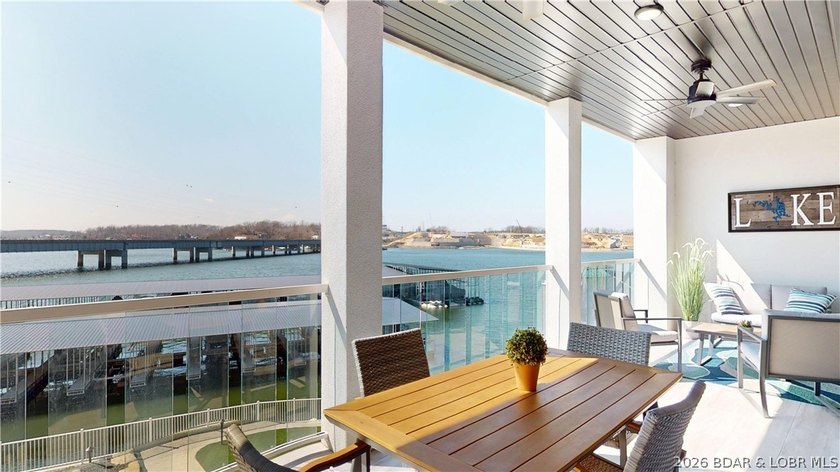 Wake up to shimmering lake views and end the day watching the - photo 26