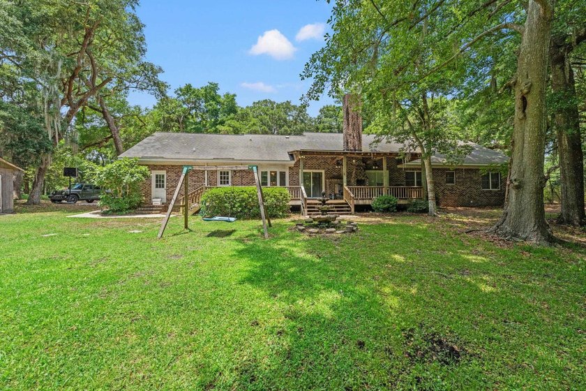 Nestled on over an acre of waterfront property in the desirable - photo 28