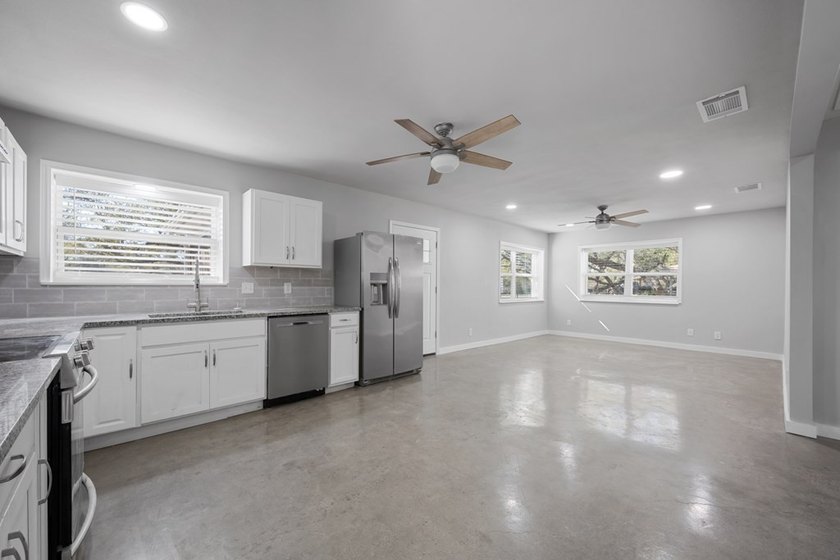 Tucked beneath the shade of towering coastal live oaks, this - photo 25