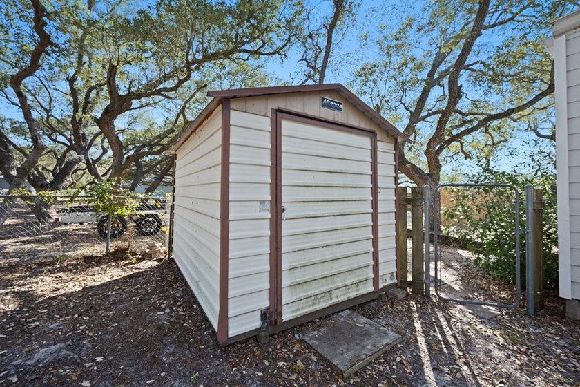 Tucked beneath the shade of towering coastal live oaks, this - photo 42