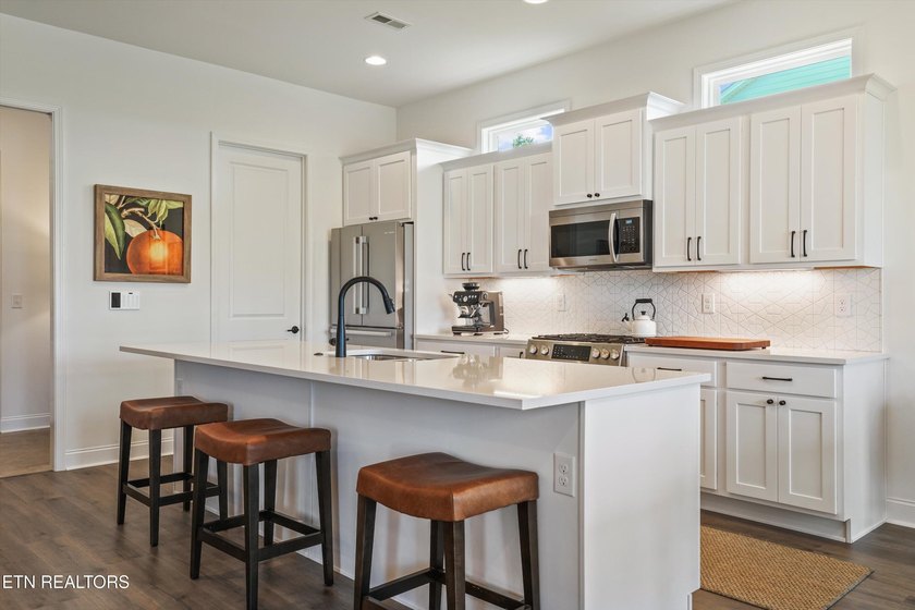 Step inside this beautifully updated ranch, built just two years - photo 10