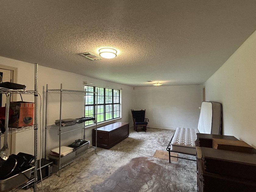 Welcome to this versatile 4-bedroom, 2-bath home offering space - photo 5