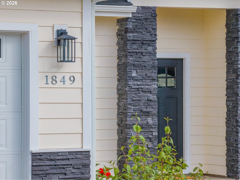 Experience modern coastal living in this custom-built 2023 home - photo 8