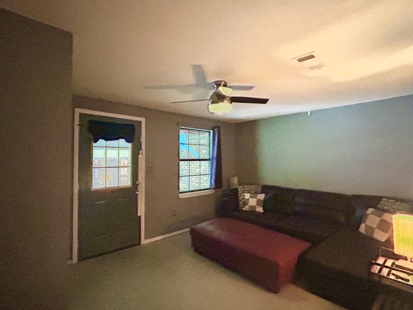 Welcome to this versatile 4-bedroom, 2-bath home offering space - photo 9