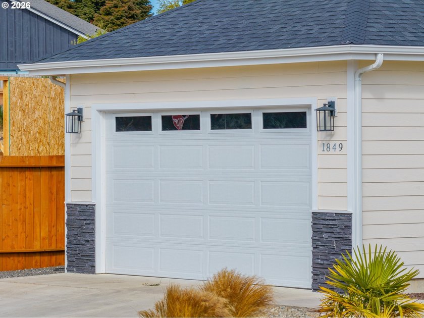 Experience modern coastal living in this custom-built 2023 home - photo 9