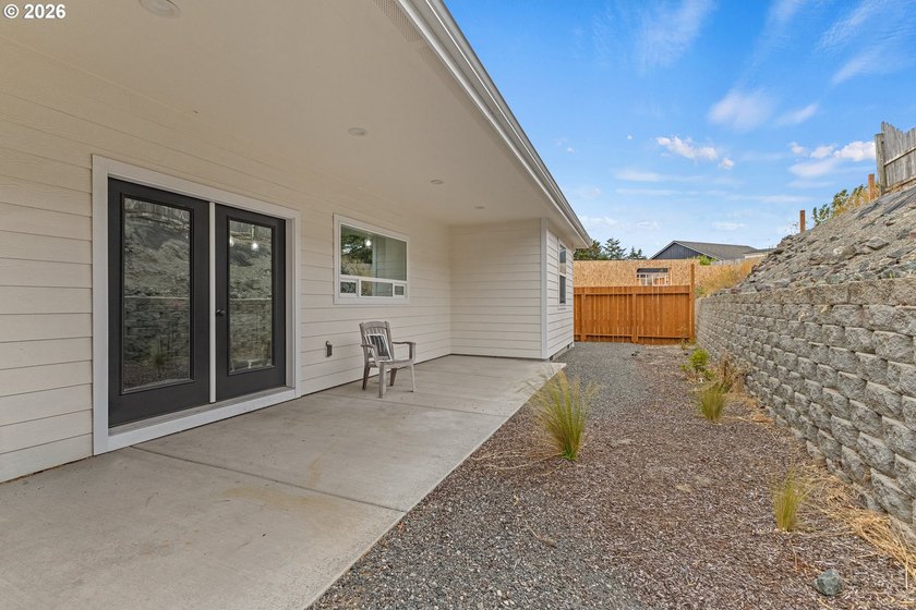 Experience modern coastal living in this custom-built 2023 home - photo 10