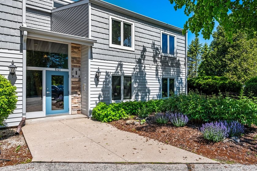 Embrace shorefront living in this beautifully updated - photo 3