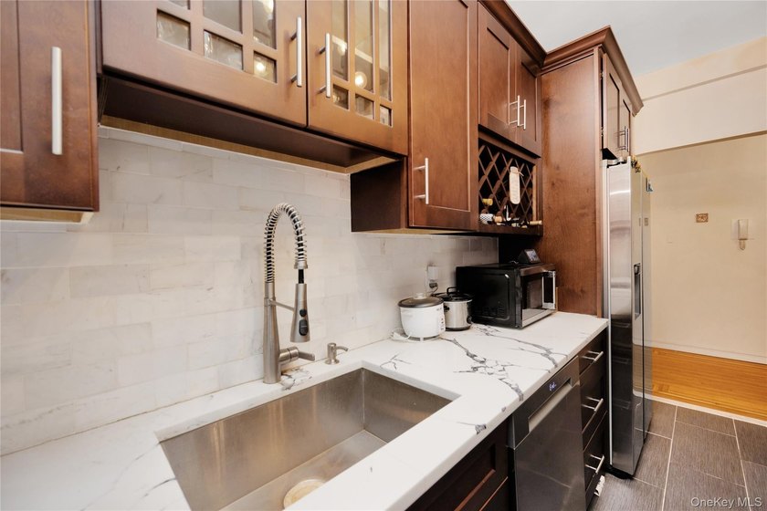 Nestled in the sought-after Valeria Arms, 7716 Austin Street #2K - photo 5