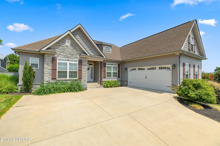 Welcome home to this beautifully crafted custom residence where - photo 2