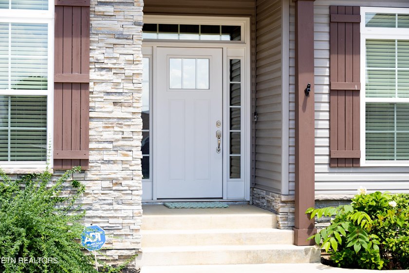 Welcome home to this beautifully crafted custom residence where - photo 3