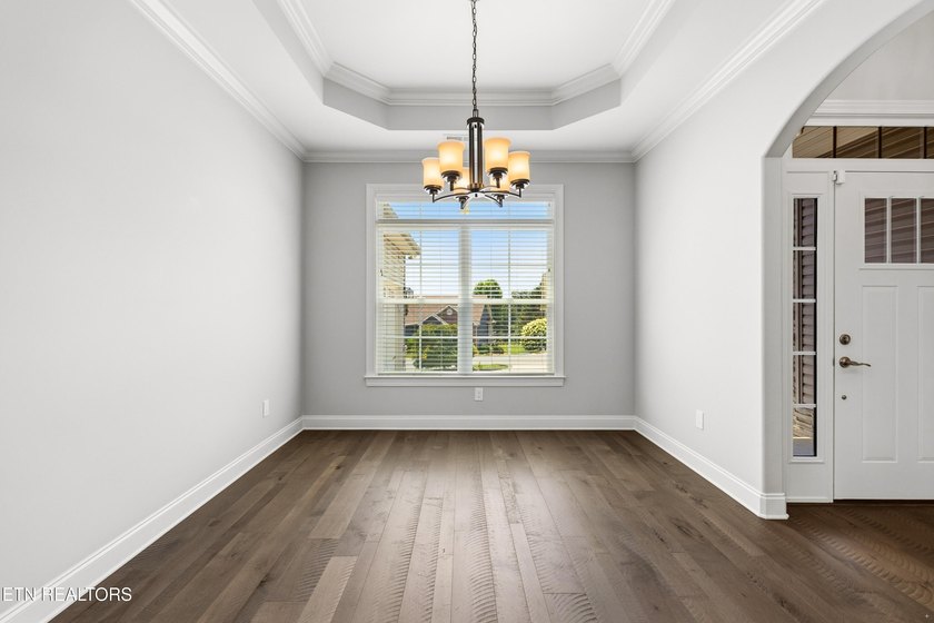 Welcome home to this beautifully crafted custom residence where - photo 7