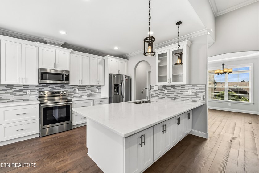 Welcome home to this beautifully crafted custom residence where - photo 10