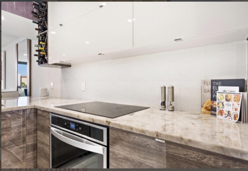 Experience coastal living in this stunning condominium located - photo 4