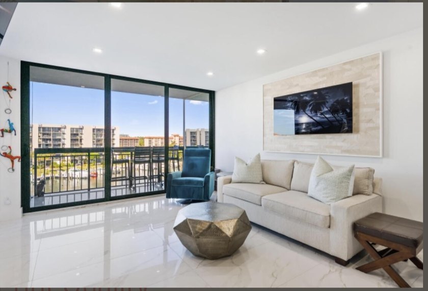 Experience coastal living in this stunning condominium located - photo 8