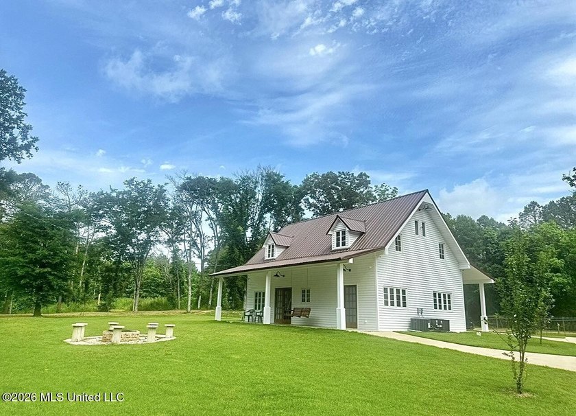 This 93+/- acre Holmes County property is uniquely laid out in - photo 2