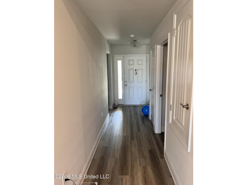 Beautiful all-brick 4-bedroom, 2-bath home that feels like - photo 3