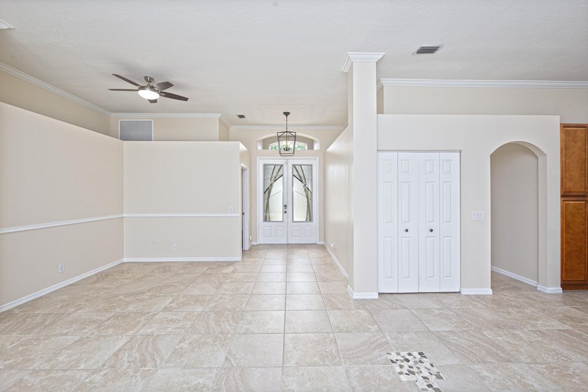 Beautifully remodeled 3BR/2BA heated saltwater pool home in - photo 8