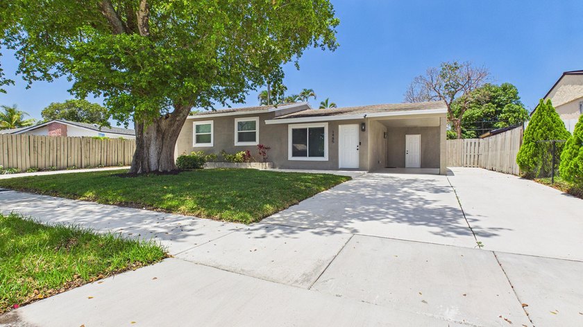 Welcome home to this beautifully remodeled 3BR/2BA residence - photo 3