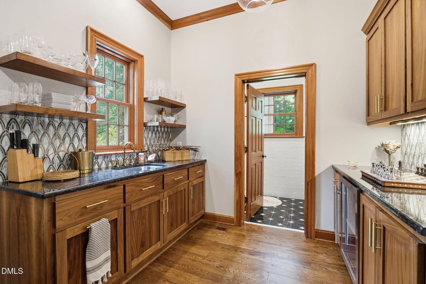 This custom-built Craftsman style home sits on 2 acres in - photo 26