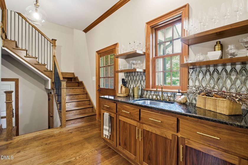 This custom-built Craftsman style home sits on 2 acres in - photo 27