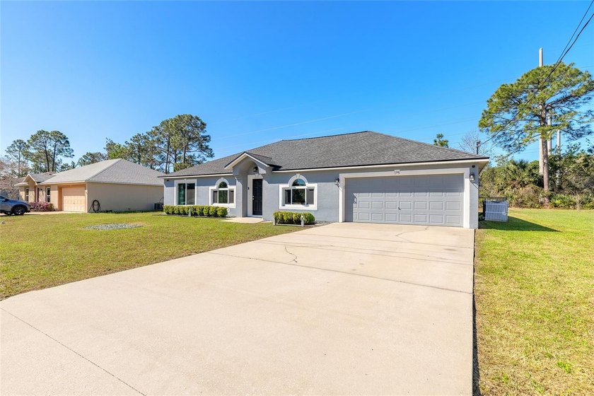 Welcome to this beautifully maintained 4-bedroom, 2-bath home in - photo 3