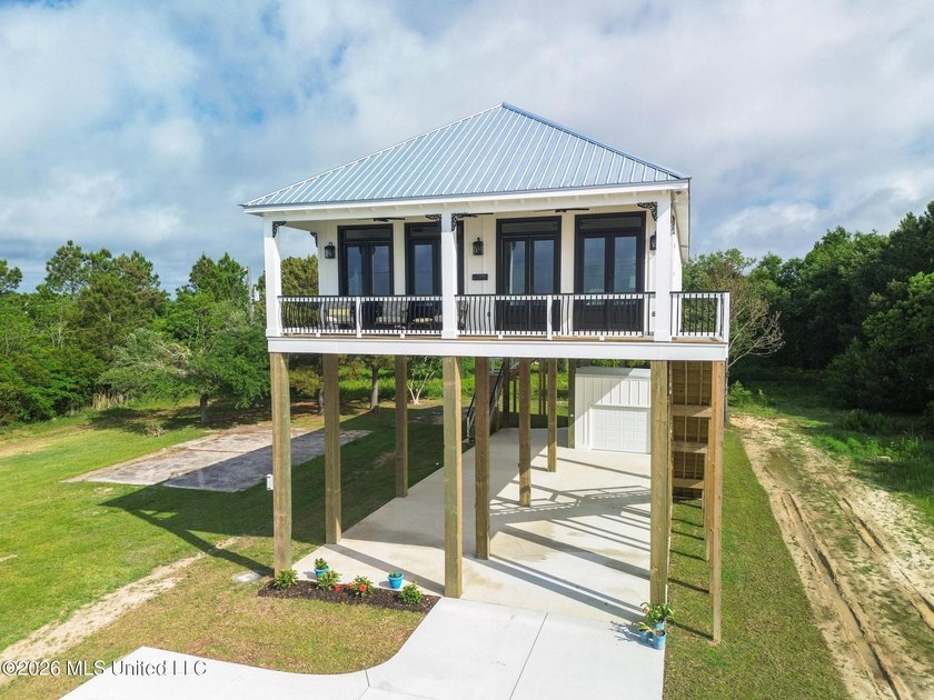Experience effortless beachfront living in this stunning turnkey - photo 5