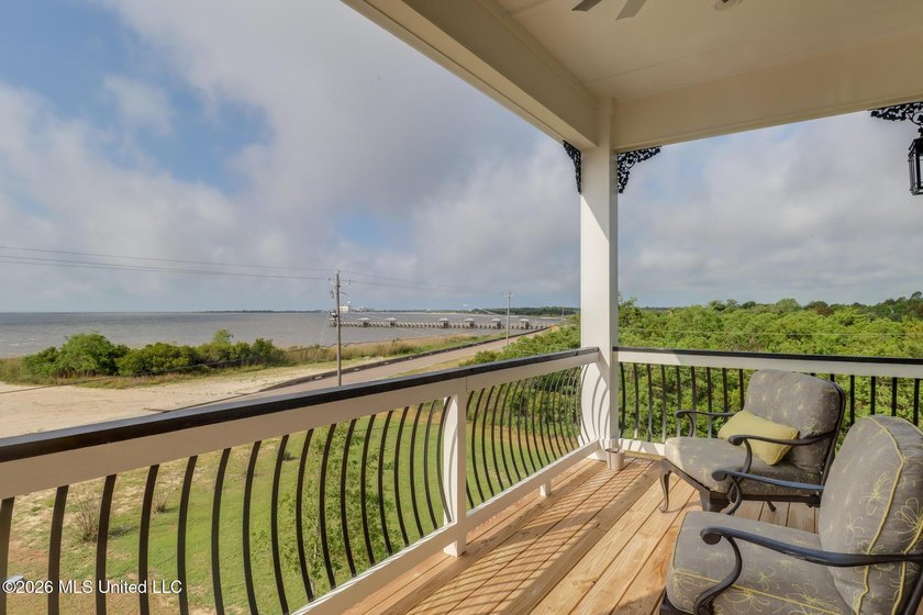 Experience effortless beachfront living in this stunning turnkey - photo 7