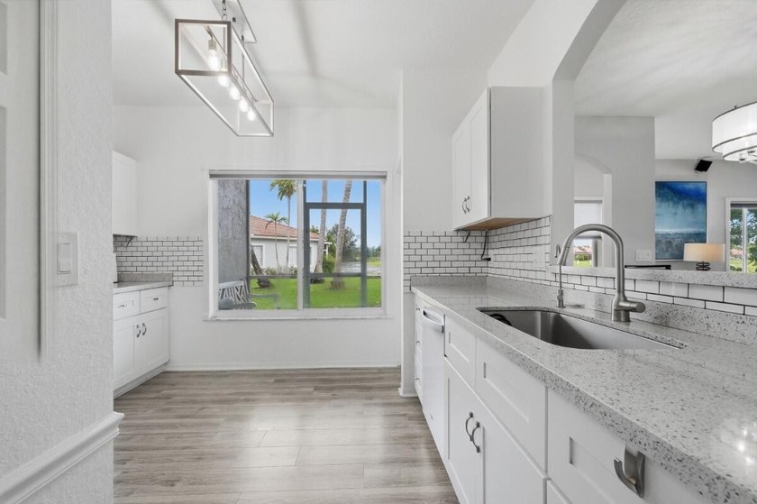 Beautifully updated 3-bedroom, 2-bath corner villa with 1,495 sq - photo 10