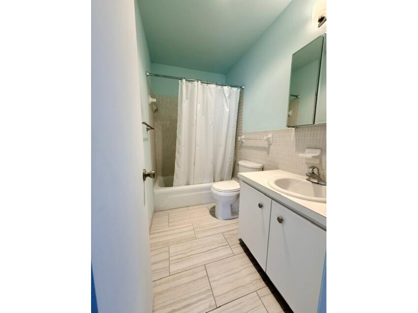 Rare corner unit filled with natural light throughout. This - photo 13