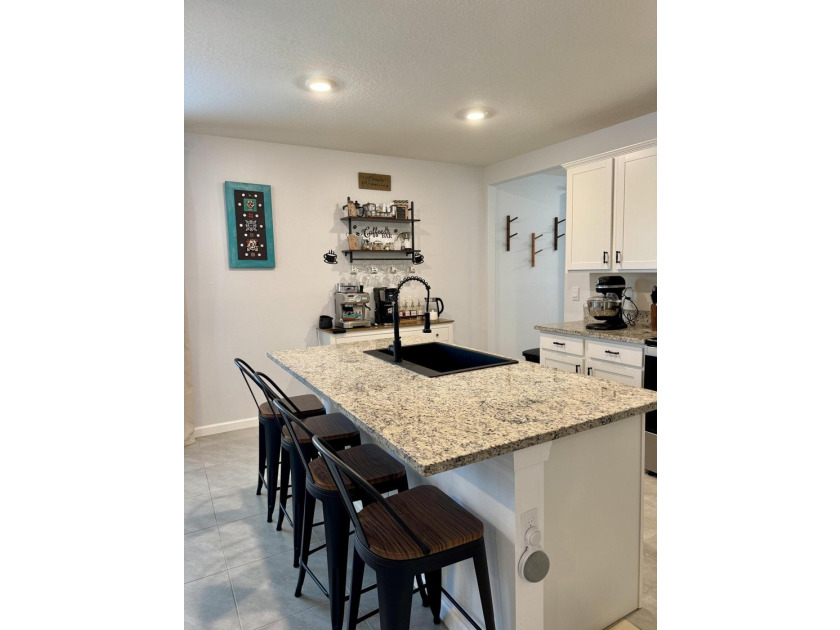 Welcome to this beautifully upgraded 3-bedroom, 2-bath CBS home - photo 9