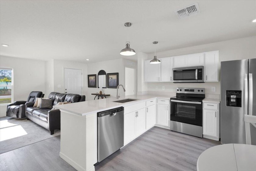Built in 2024 and upgraded beyond builder grade, this - photo 3