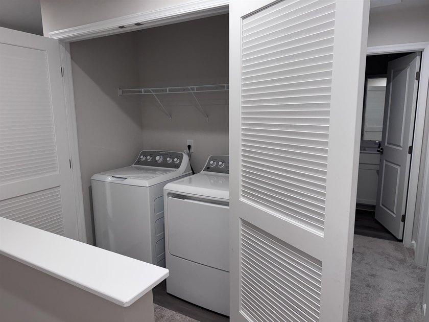 Welcome home to this never-before-lived-in end unit 3-bedroom, 2 - photo 12
