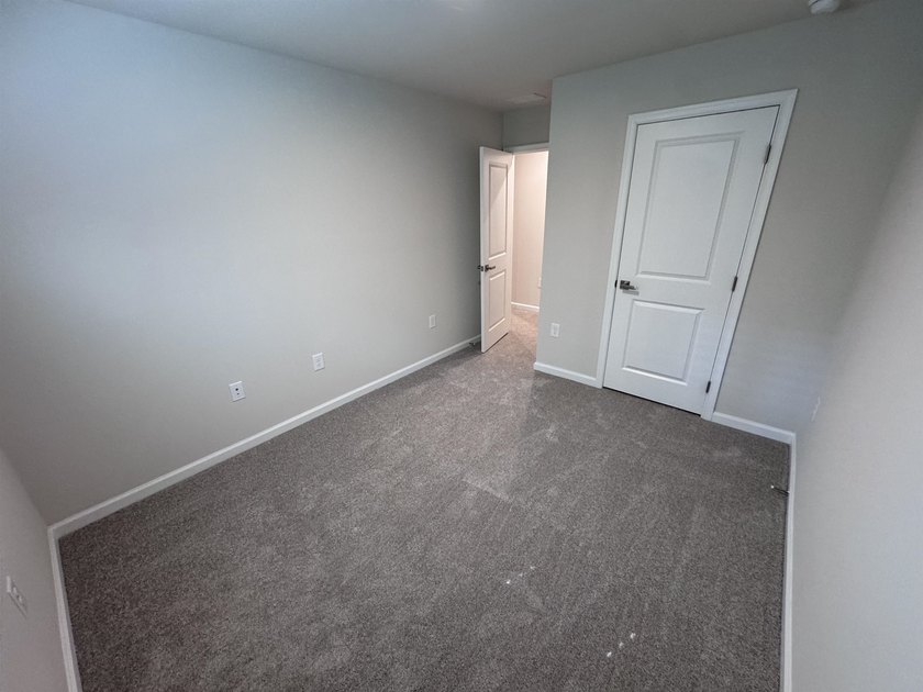 Welcome home to this never-before-lived-in end unit 3-bedroom, 2 - photo 18