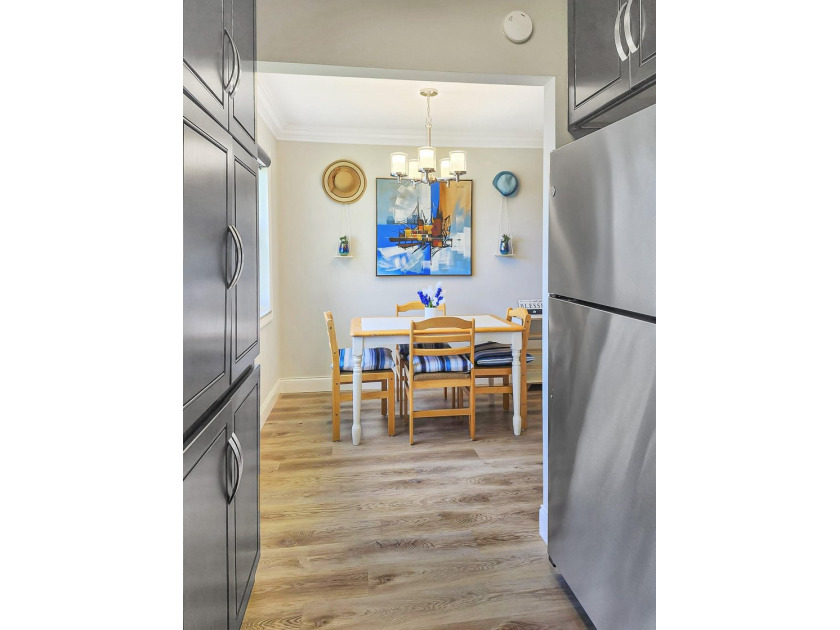 UPDATED! UPDATED! UPDATED! NEWLY RENOVATED CORNER UNIT ON THE - photo 11