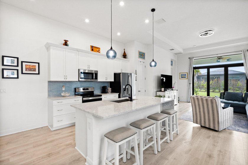 Welcome to luxury living in PGA Verano! This 2024 Alison model - photo 12