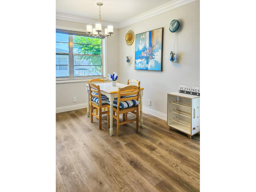 UPDATED! UPDATED! UPDATED! NEWLY RENOVATED CORNER UNIT ON THE - photo 12